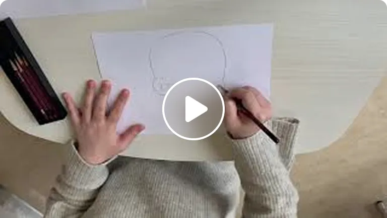 パパっと書いたのにそっくりな似顔絵(卒業生)